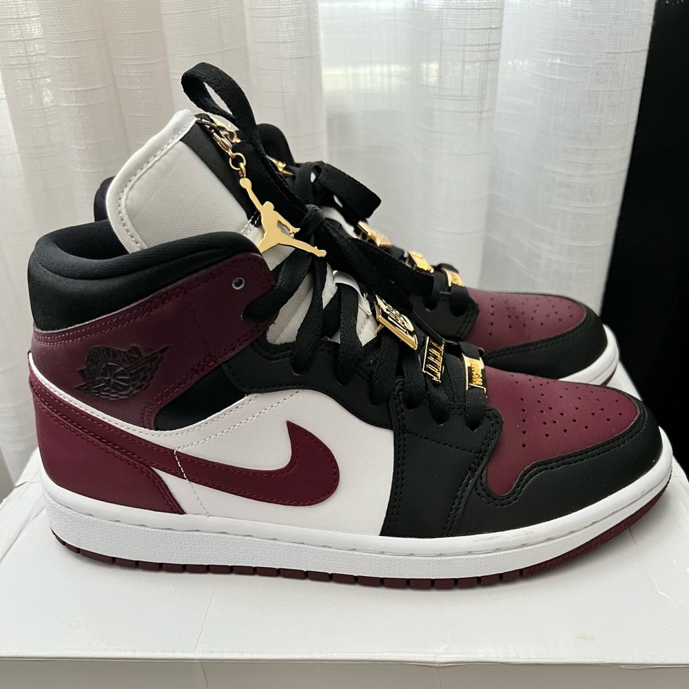 Woman’s Air Jordan 1 Mid Size 8.5